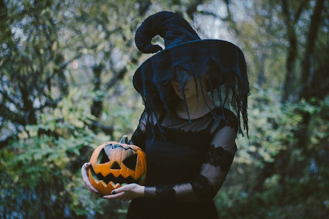 Halloween costume photography, a woman in a witch costume
